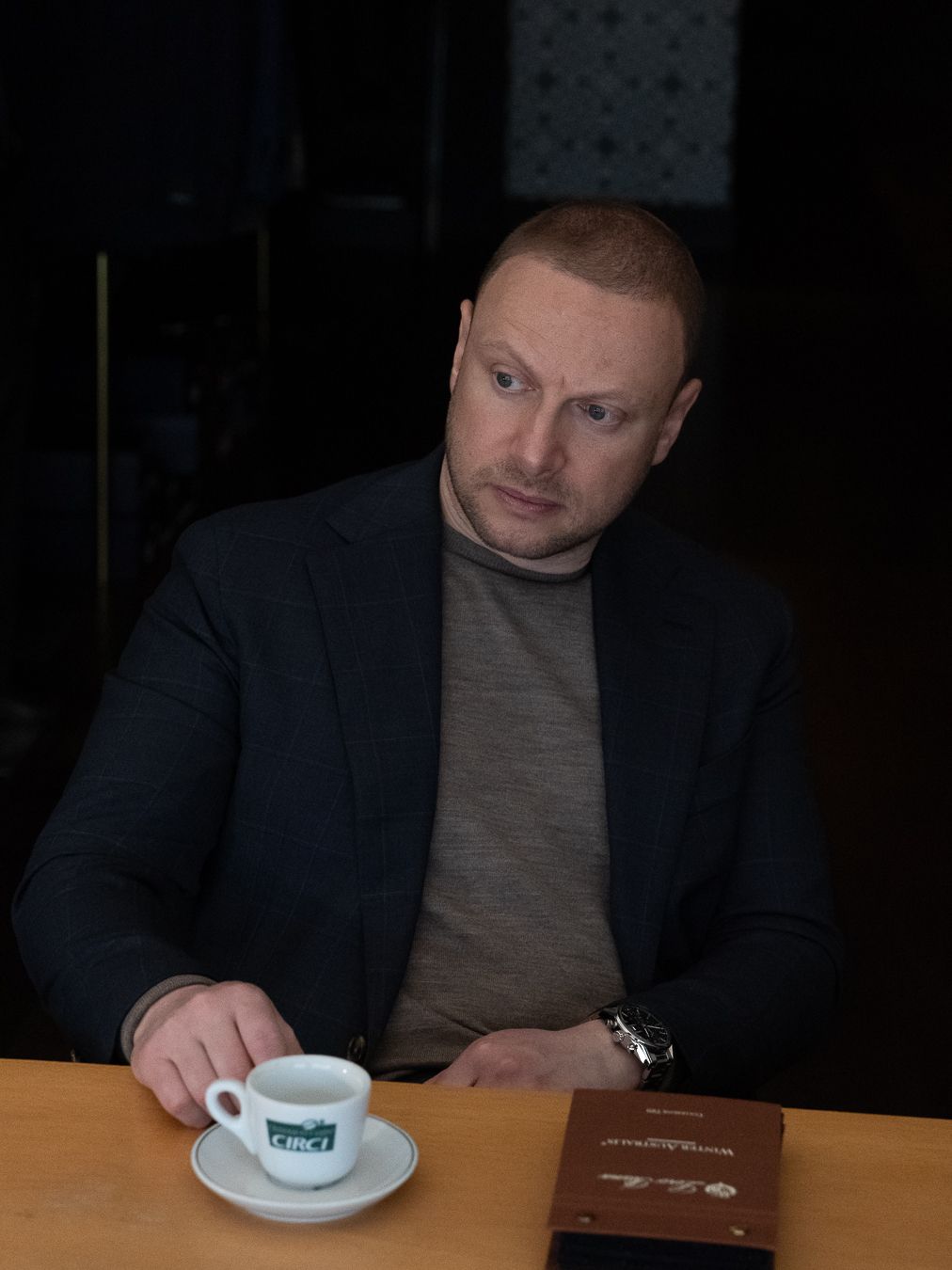 Deorum's founder Joseph, having a coffee by his desk